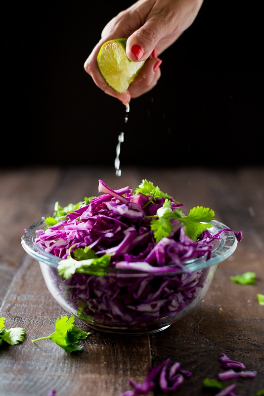 food photography with lemon squeezed onto cabbage for a photography project idea
