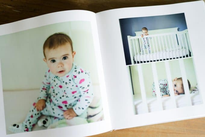 Photo of a child in a crib from a photo book for a photo gift idea.